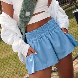 Free People Movement Get Your Flirt On Shorts in the color blue (cloudy waters)
